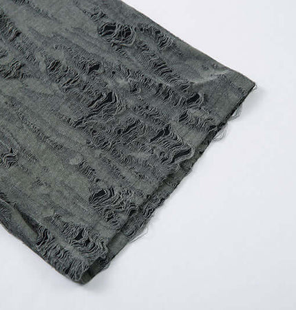 Distressed Short Sleeve Shirt - Loose Fit showing the fabric texture and distressed design details.