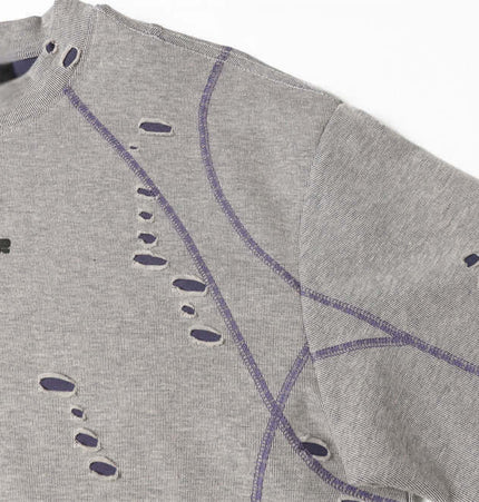 Distressed Short Sleeve TShirt – Loose Fit featuring unique patches and ripped detailing for a bold summer streetwear look.