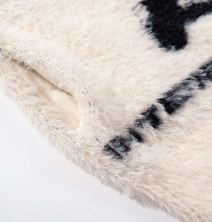 Floral Jacquard Knit Cardigan – Loose Fit detailed view showcasing soft fabric texture and design.