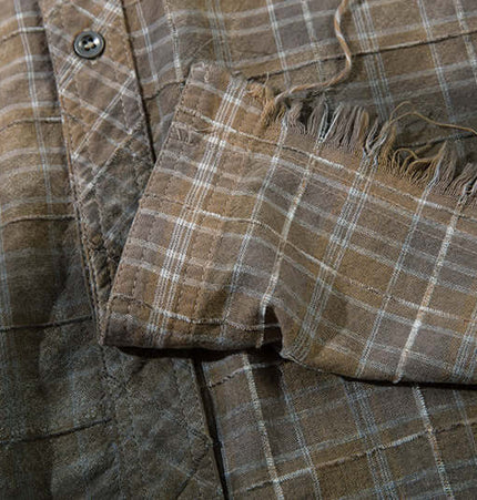 Radiant Plaid Distressed Shirt – Loose Fit featuring frayed hem and vintage plaid pattern.