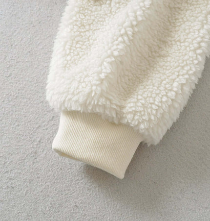 Close-up of the sleeve of the Winter Lamb Wool Quilted Cotton Jacket showing fluffy lamb wool and ribbed cuff.