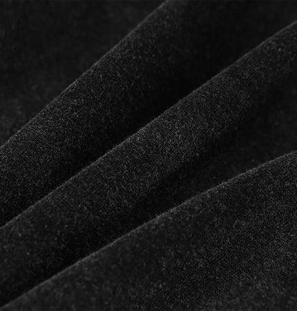 Close-up of black fabric texture showcasing softness and luxurious feel, ideal for American Retro Washed Hoodie – Loose Fit.