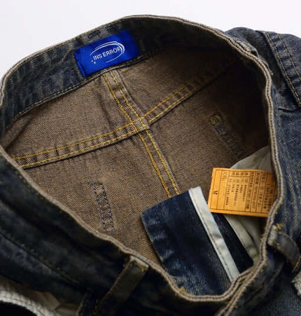 Vintage Washed Cartoon Embroidered Jeans inside view showcasing playful embroidery and label details.