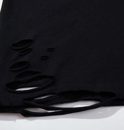 Detail of the fabric on the Butterfly Print TShirt – Loose Fit showing distressed edges and casual design.