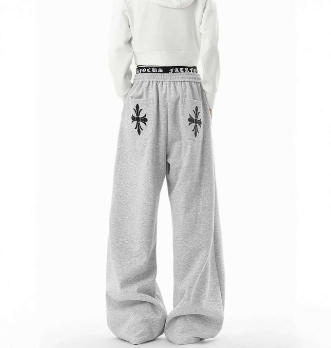 Winter Wide-Leg Pants – Relaxed Fit showing the back view of gray trousers with a relaxed silhouette and stylish details.