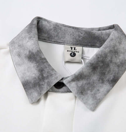 Retro Embroidered Patchwork Polo Hoodie collar detail with textured fabric and label visible.