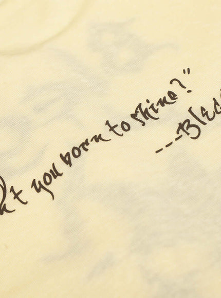 Close-up of White abstract print round neck sleeve fabric