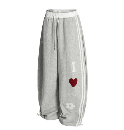 Towel Embroidery Heart Sweatpants with bold heart graphic and soft fabric for relaxed street style.