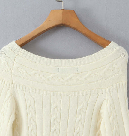 Off-Shoulder Twists Slim Knit Sweater in cream color, showcasing twisted design and relaxed fit.