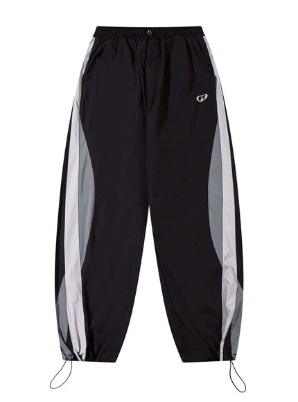 Black paneled technical track pants with Grozavu logo