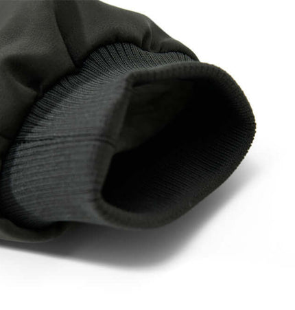 Close-up of the ribbed hem detail of the Street Style Cotton Jacket – Loose Fit, showcasing casual urban fashion.