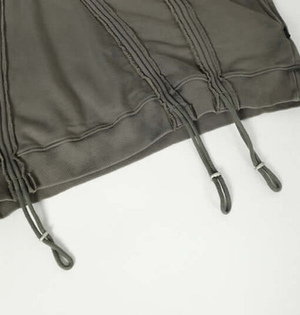 Stripe Patchwork Hoodie – Loose Fit showing detail of drawstrings and stitching design.