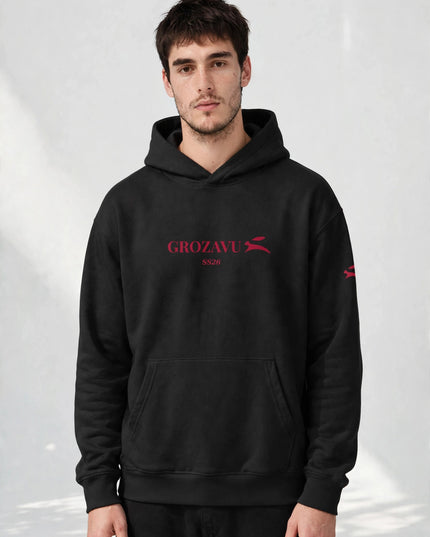 Side profile of the black lined-hood sweatshirt with elastane-free rib