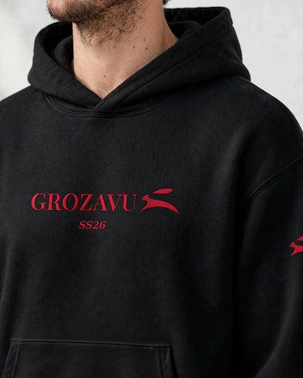 Back view of the black 280 g/m² organic cotton lined-hood sweatshirt