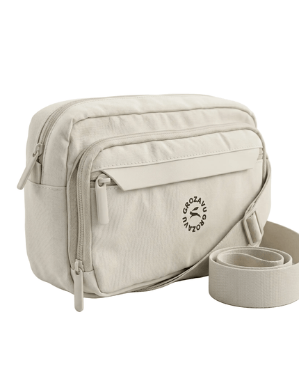 Maison Grozavu Onyx Crossbody Fit — rear view displaying the back panel detailing and structured hemline in neutral