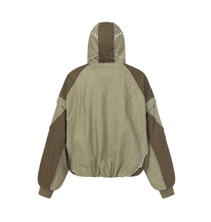 Back view of the Patchwork Distressed Hooded Jacket showcasing its raw edge and color-block design.