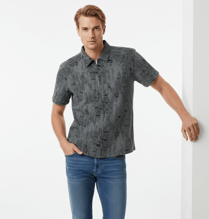 Distressed Short Sleeve Shirt - Loose Fit worn by a man, showcasing modern streetwear style and a comfortable look.