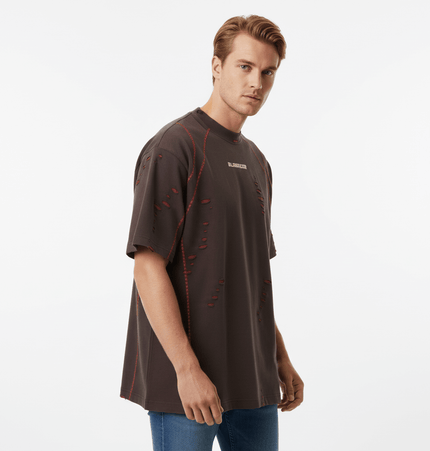 Distressed Short Sleeve TShirt – Loose Fit, featuring patchwork and ripped detailing for summer streetwear style.