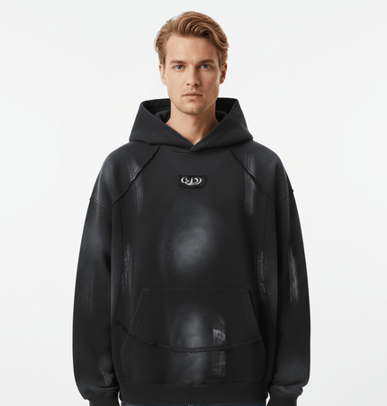 Creative Vintage Hoodie – Loose Fit worn by a model, showcasing a unique artistic graphic design and casual style.