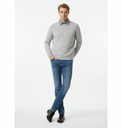 Faux Layered Knit Sweater with Collar worn by a man styled with jeans and a checkered shirt collar.