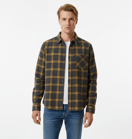 Casual Plaid Shirt – Relaxed Fit worn by a man, featuring a plaid pattern in gray and yellow, perfect for casual styling.