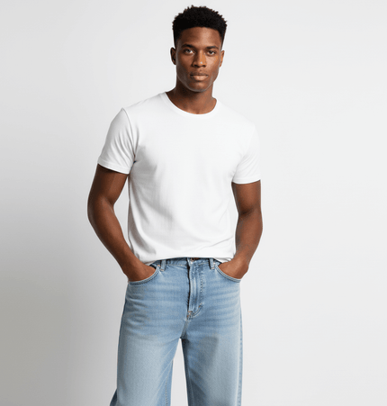 Model wearing Washed Micro Flared Jeans – Loose Fit and a white t-shirt, showcasing casual streetwear style.