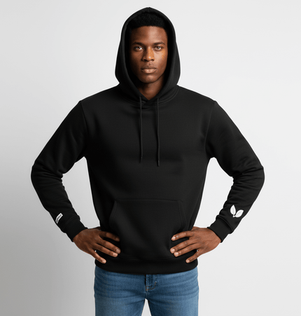 Cross Embroidered Hoodie – Loose Fit worn by model, showcasing a minimalist design and hooded style.