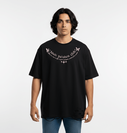 Butterfly Print TShirt – Loose Fit in black with distressed detailing and playful graphic design.