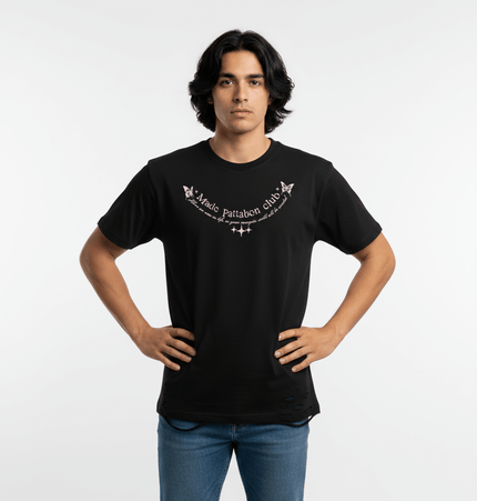 Butterfly Print TShirt – Loose Fit in black, featuring a playful butterfly design and a relaxed silhouette.