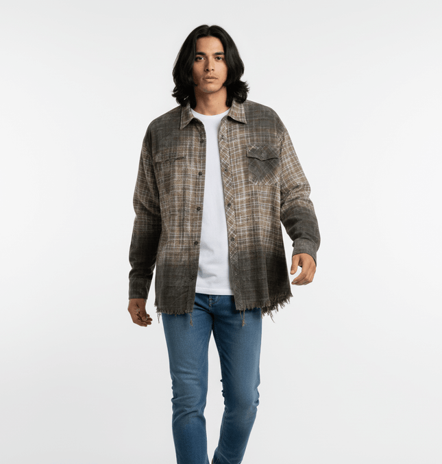 Radiant Plaid Distressed Shirt – Loose Fit worn by a model showcasing its relaxed fit and stylish frayed hem design.