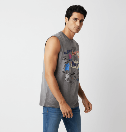 Cartoon Print Cotton Tank Top – Loose Fit model wearing gray tank top with playful cartoon graphics.