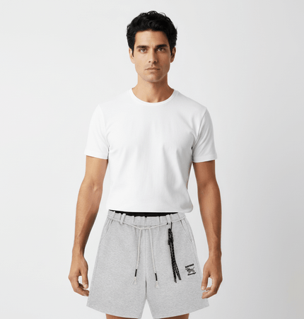 Model wearing Straight Leg Drawstring Shorts – Loose Fit paired with a white t-shirt for a casual look.