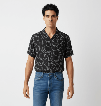 Striped Short Sleeve Shirt - Loose Fit displayed on a model, featuring bold patterns and casual style.