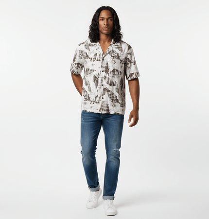 Oil Painting Print Shirt - Loose Fit model wearing relaxed streetwear with artistic design and casual jeans.