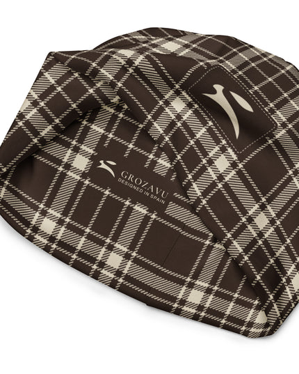 Heritage Tartan Beanie in cocoa brown and bone tartan, turned inside out to show the printed Grozavu label