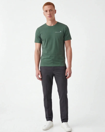 Front view of the Maison Grozavu Bone Tee Foundation in shirt — showing the tailored hem.
