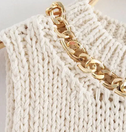 Asymmetrical Chain Knit Tank Top – Slim Fit featuring a decorative gold chain detail on textured ivory fabric.
