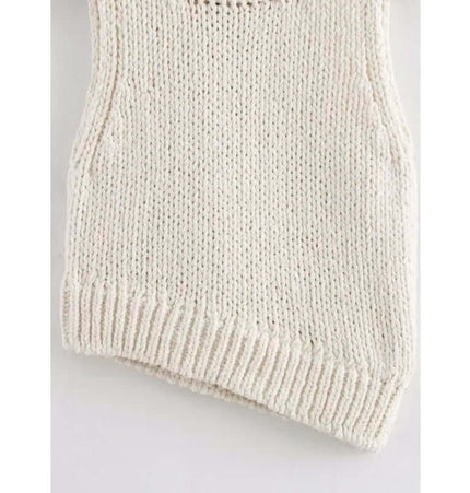 Asymmetrical Chain Knit Tank Top – Slim Fit featuring a unique asymmetrical cut and ribbed hem design.