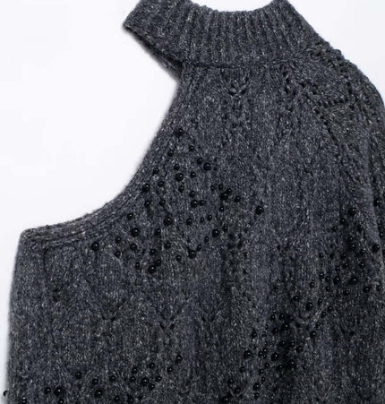 Asymmetrical Off-Shoulder Knit Sweater with hollow bead decoration and half turtleneck collar in grey.