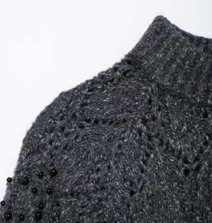 Asymmetrical Off-Shoulder Knit Sweater with hollow bead decoration and half turtleneck collar, in textured dark gray.