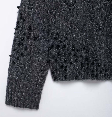 Asymmetrical Off-Shoulder Knit Sweater featuring hollow bead decoration in a stylish gray knit fabric.