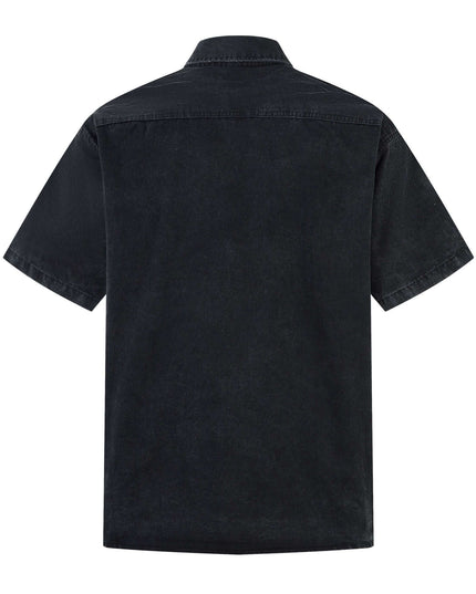 Rear view of the Maison Grozavu Earth Shirt Mark in style — showing the tailored hem.