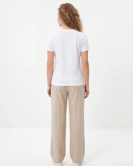 Maison Grozavu Minimalist Tee - Basalt Volume — rear view showing the back panel construction and White colourway hemline detail