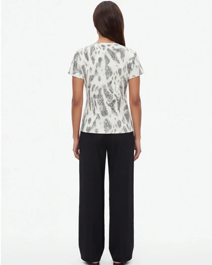 Maison Grozavu Seamless Quartz Tee — rear view showing the back panel construction and neutral colourway hemline detail