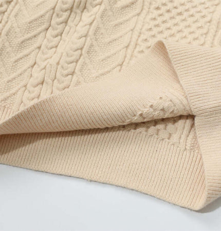 Letter Beaded Knit Sweater – Loose Fit detail showing textured fabric and cuffs in apricot color.