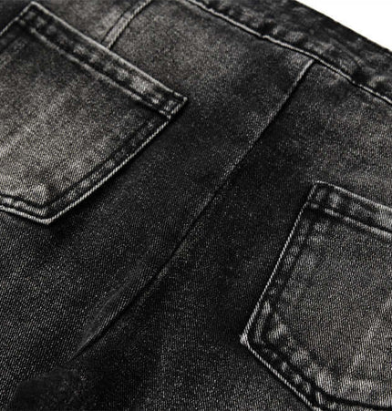 Belted Distressed Cargo Jeans close-up showing back pockets and dark washed denim texture.