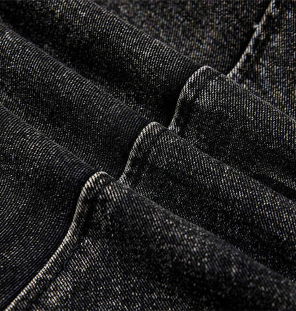 Close-up of heavyweight fabric for Belted Distressed Cargo Jeans, showcasing the unique texture and style details.