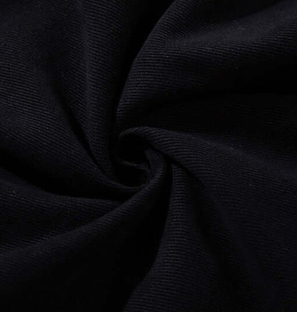 Close-up of fabric texture showing the dark elastic material of Graffiti Printed Cargo Denim Pants.