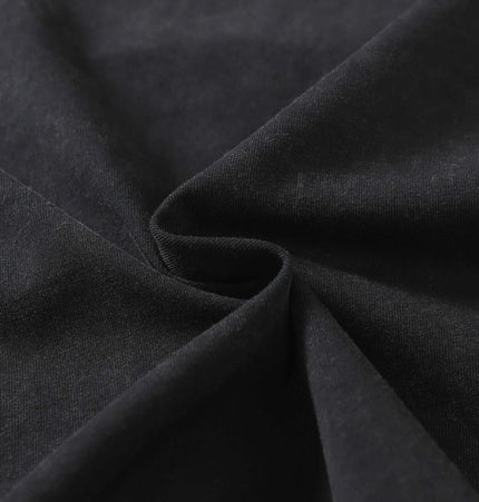 Close-up of soft black fabric showing texture, ideal for Retro Washed Letter Print TShirt – Loose Fit.