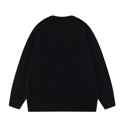 Back view of the Grozavu Embroidered Cable Knit VNeck Sweater showcasing its relaxed fit and premium quality.